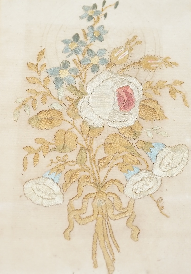 Two framed 19th century silk embroidered panels, one of flowers in a classical shaped vase, the other a ribboned posy of flowers, tallest 20.5cm high. Condition - some faint staining to backing and colour of silks